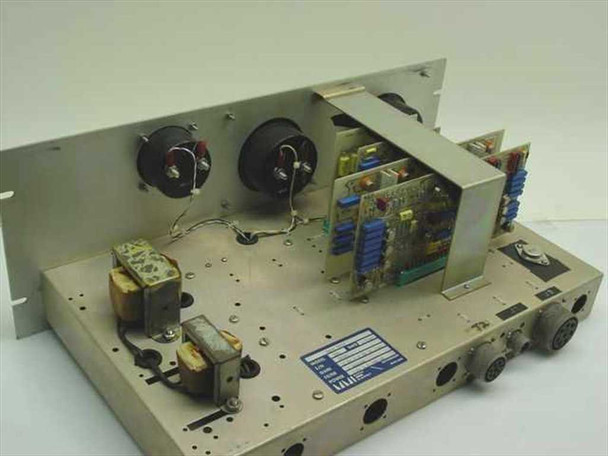 Marsh-McBirney Model 500 internal view with top cover removed — two transformers, circuit board assembly, wiring harness, and component layout visible