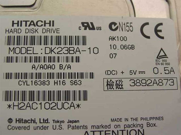 Hitachi DK23BA-10 hard drive label showing 10.06GB capacity, 5V 0.5A power, model number, and certification markings
