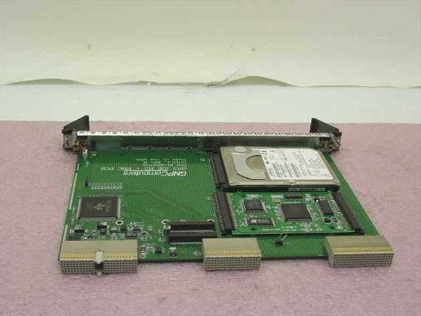 GNP Computers cPCI IDE HD PMC PCB 1-502703 — bottom-side view showing CompactPCI connector fingers, onboard ICs, and Hitachi IDE hard drive from the reverse angle