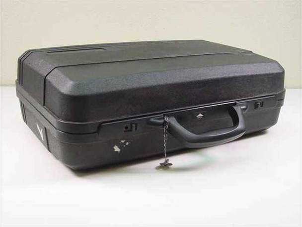 Unbranded hard shell carry case closed view showing top handle and lock with key attached on chain