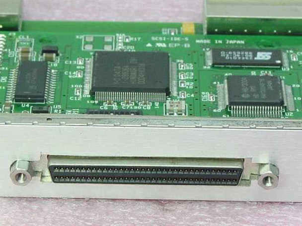 Close-up of board chipset area showing main SCSI-IDE controller ICs and 68-pin SCSI connector edge