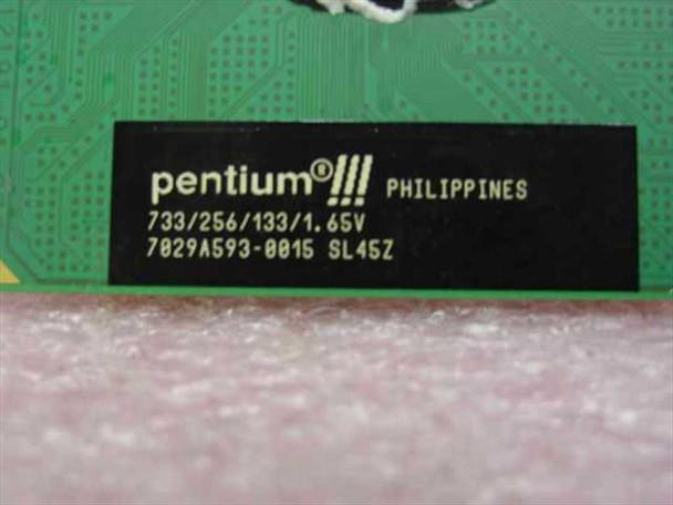 Intel Pentium III SL45Z processor label close-up showing 733/256/133/1.65V markings and S-spec SL45Z