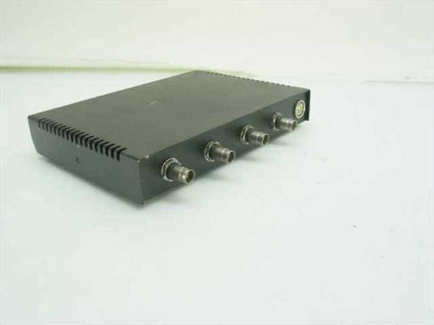 Black Box Multiport Repeater 1050 LE1050A-BNC rear and side angled view showing four BNC connectors and one circular DIN power connector