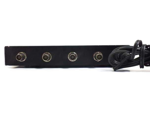 Black Box Multiport Repeater 1050 LE1050A-BNC rear panel view showing four BNC coax ports with power cable attached