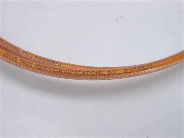 Times Fiber Communications RG-1420/U cable jacket close-up showing printed manufacturer name and cable designation