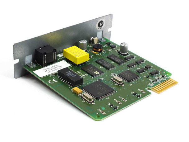 APC AP9606 Smart Slot Management Card — reverse angled view showing green PCB with multiple ICs, yellow capacitor, transformer, and Smart Slot edge connector