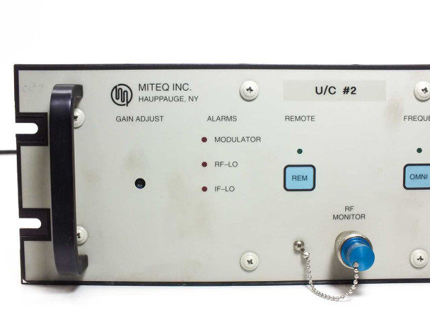 Miteq U-8153/38152 front panel close-up – Alarms section showing Modulator, RF-LO, IF-LO LEDs; Remote REM button; RF Monitor BNC port