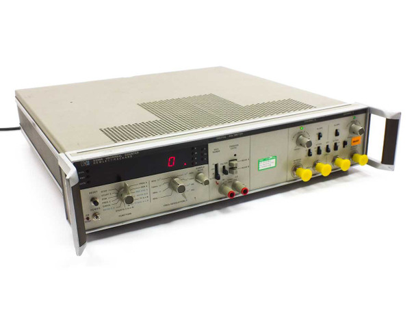 HP 5328A Universal Frequency Counter Digital Voltmeter — front panel 3/4 view showing LED display, yellow BNC input knobs, and front controls