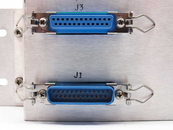 Varian VJW6703AR00 rear connector detail – close view of blue 25-pin D-sub female connectors labeled J3 (top) and J1 (bottom) with locking bail hardware