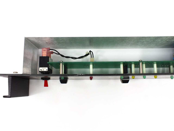 Varian VJW6703AR00 interior bottom/side view – showing green PCB assembly with red power switch, multicolored indicator LEDs, and wiring harness