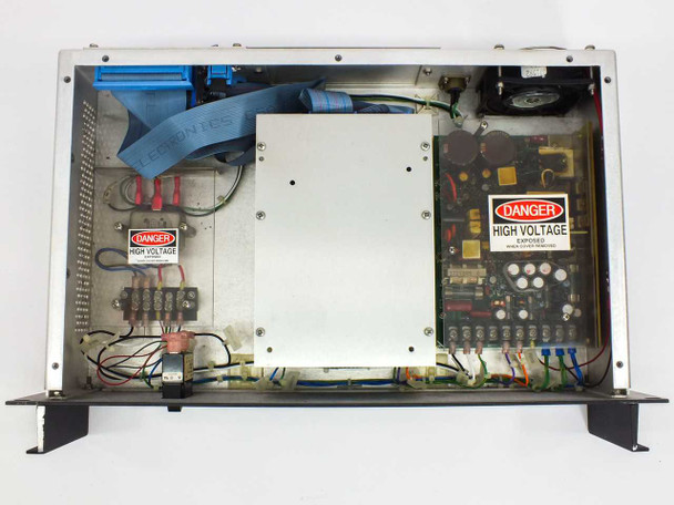 Varian VJW2740-10-1 interior view with cover removed showing internal PCBs, power supply section with DANGER HIGH VOLTAGE labels, blue ribbon cable, and wiring harness