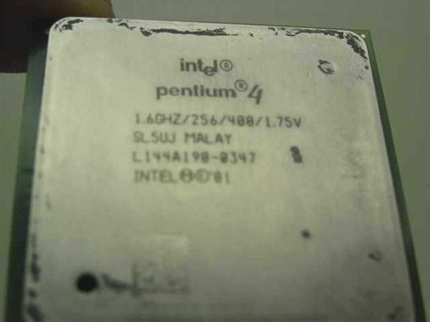 Intel Pentium 4 SL5UJ 1.6GHz CPU — close-up of top lid label showing SL5UJ sSpec, MALAY origin, and 2001 date code