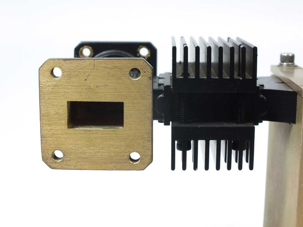 MCS 4009-0000G1 end view showing WR-75 waveguide flange aperture 19.05mm x 9.525mm with rectangular opening and mounting holes