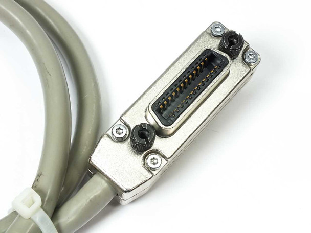 Close-up of one straight 24-pin Micro-Ribbon GPIB connector end with metal shell and thumb screws