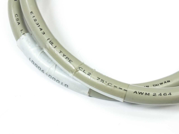 Close-up of cable jacket markings showing UL E123143, CSA, Type CL2, 75°C, AWM 2464, Made in Taiwan, and asset label LD006-400010
