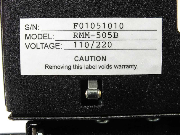 Videotek RMM-505B label showing serial number F01051010, model RMM-505B, and voltage rating 110/220V, with lock cylinder visible below