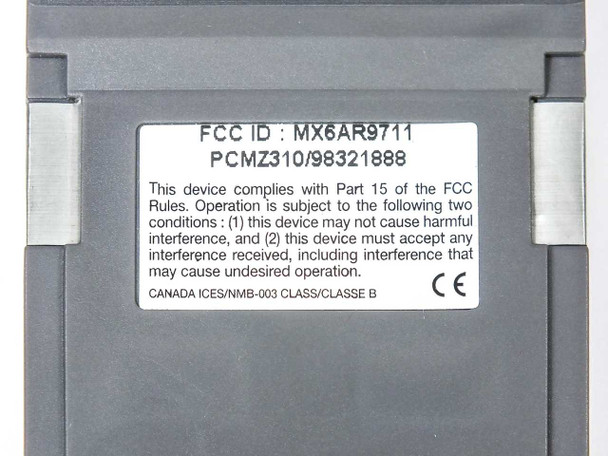 Microtech PCMCIA adapter rear label showing FCC ID MX6AR9711, model PCMZ310, and CE/FCC compliance text