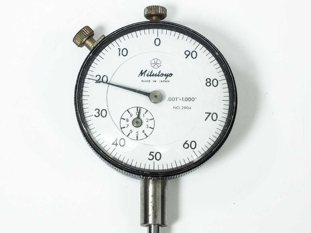 Mitutoyo 2904 dial indicator close-up of dial face showing 0.001"–1.000" graduation markings, revolution counter, and No. 2904 model label