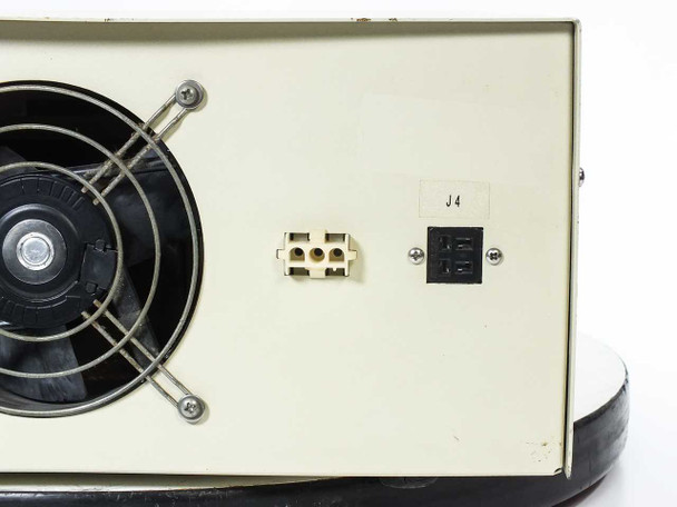 BTS PS1200 rear panel left section close-up showing IEC inlet J1, terminal block J2, duplex AC outlet, and rating plate