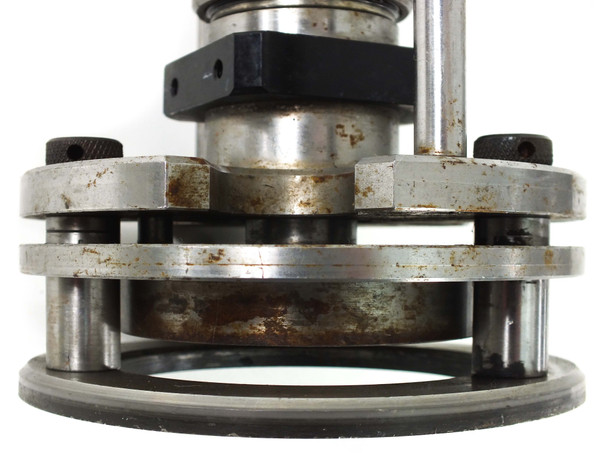 Logitech PM2A ring polishing jig head – full front three-quarter view showing circular ring frame and central spindle assembly
