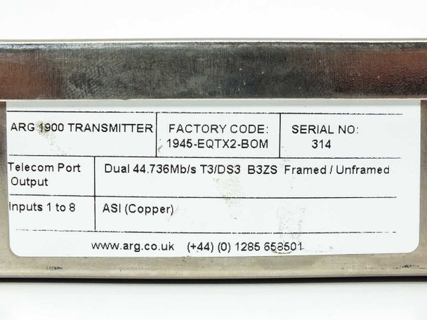 ARG 1900 Transmitter rating label – showing factory code 1945-EQTX2-BOM, serial number 314, dual T3/DS3 B3ZS telecom output specs, and ASI copper inputs 1–8