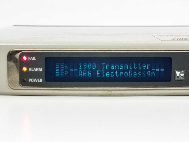 ARG 1900 Transmitter front panel LCD close-up – display reading '1900 Transmitter / ARG ElectroDesign' with FAIL, ALARM, and POWER LED indicators