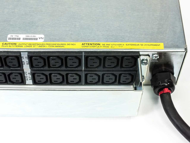 Techniques PT630D rear panel opposite end showing second bank of 12 IEC C13 output receptacles, caution label, and input cable connection point