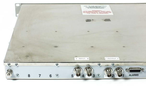 ARG 2400 Series Protection Switch rear panel close-up showing BNC A/B input and DS3 output connectors, alarms DB-15 port, labeled Input A/B and Output 1/2
