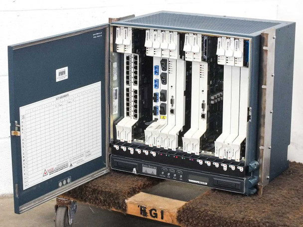 Cisco ONS 15454 shelf with front door open, revealing full complement of installed line cards and TCC modules