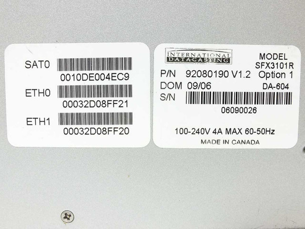 International Datacasting SFX3101R label – showing model SFX3101R, P/N 92080190 V1.2, Option 1, DA-604, DOM 09/06, 100-240V 4A, Made in Canada, with MAC address barcodes for SAT0, ETH0, ETH1