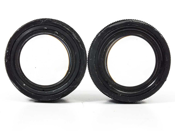 Nikon CFUW 10x eyepiece pair — top-down view of both eyepieces showing damaged and chipped plastic around the top edges