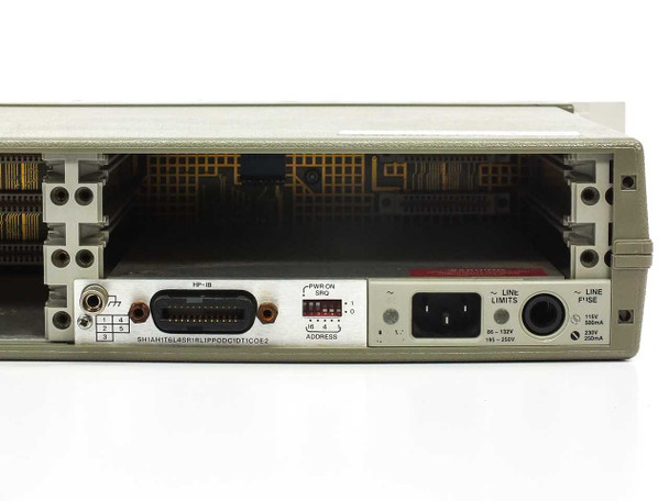 HP 3488A rear panel close-up showing HP-IB GPIB port, DIP address switches, IEC AC inlet, and voltage selector