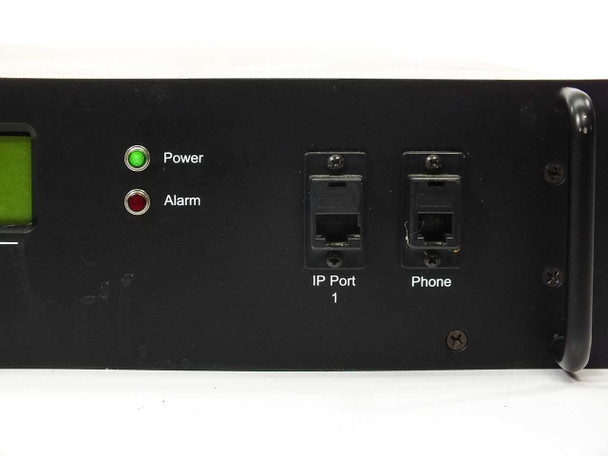 Americom AST3100 front panel right side close-up showing Power and Alarm LED indicators, IP Port 1 RJ45 jack, and Phone jack