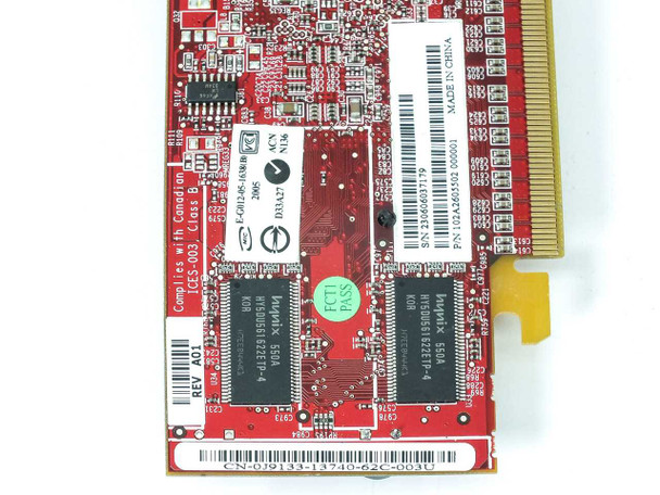 ATI Radeon X600 PCB close-up — memory ICs, Dell CN-0J9133 label, part number 102A2605502, REV A01 marking, and FCCT PASS sticker visible