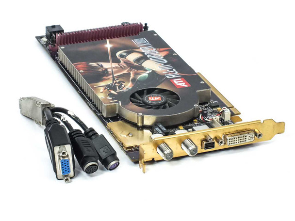 ATI All-In-Wonder X1800XL 256MB PCIe video card — front oblique view showing cooler shroud and included breakout dongle with VGA and S-Video connectors