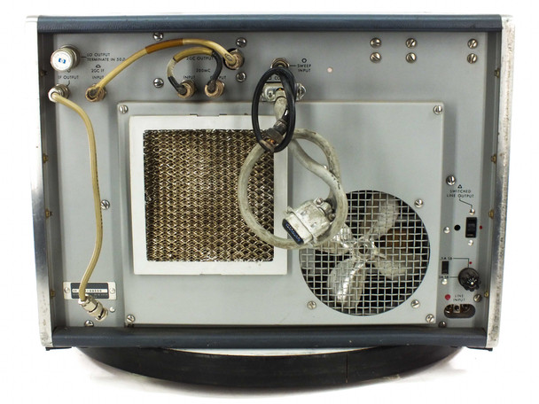 HP 8551A Spectrum Analyzer rear panel full view — fan, ventilation grille, coaxial rear connectors, fuse panel, and SWITCHED LINE OUTPUT visible