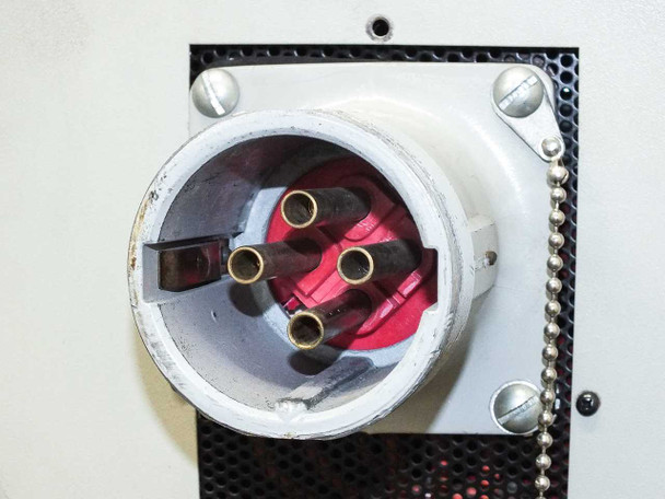 Eratron PPS 8210 – close-up of 3-phase industrial power inlet with cap removed, showing 4-pin configuration