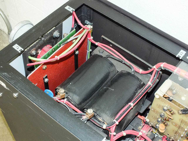 Eratron PPS 8210 – interior close-up showing dual-winding power transformer wrapped in insulation, red wiring, and control board assembly
