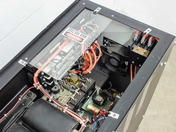 Eratron PPS 8210 RS MF – interior detail of power electronics section showing control components, high-voltage warning label, cooling fan, and wiring