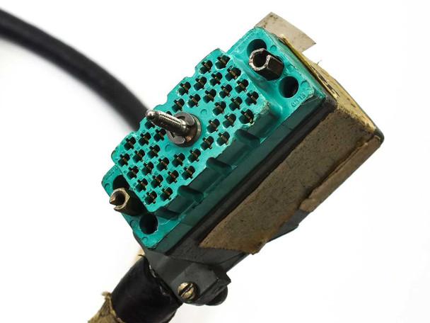 ELCO 38-pin multipin connector close-up — front face showing green insert with 38 pin contacts and brass backshell