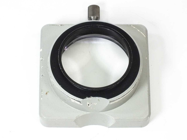 Carl Zeiss 47 50 61 SV8 objective — top-down view showing circular lens element and bayonet mount ring; paint loss visible on silver housing