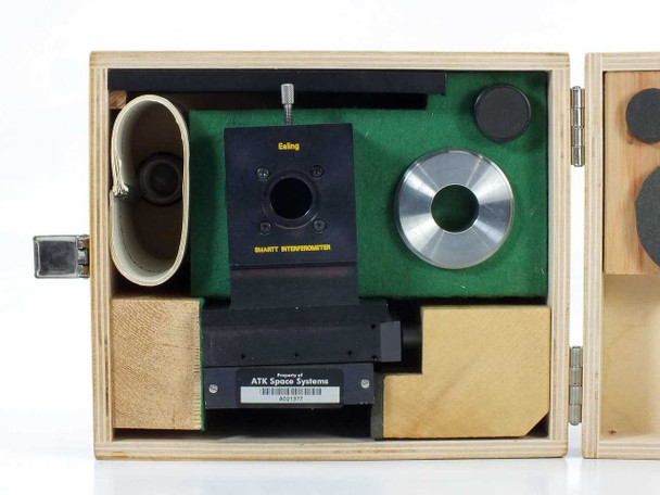 Ealing 25-9218 Smartt Interferometer stored in green-felt-lined wooden carrying case with all accessories — ATK Space Systems label visible