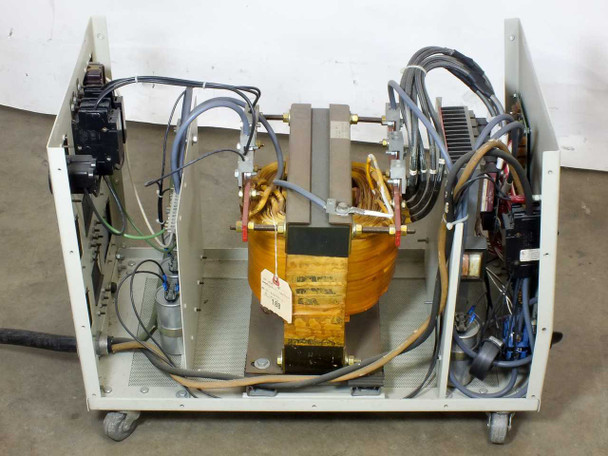 AAA Power System CP6 internal view from rear — toroidal transformer, red bus bars, wiring runs, and right-side control subassembly