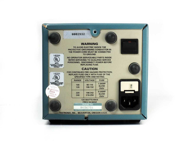 Tektronix TM502A rear panel close-up showing voltage selector fuse chart label (100–240V, 50/60Hz, 120W Max), IEC inlet, red power switch, UL listing marks, and Beaverton Oregon manufacture label