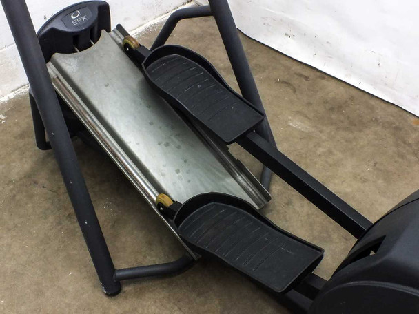 Precor EFX 5.17 foot pedal rails and pedals — close-up showing sliding rail assembly and rubber pedal surfaces