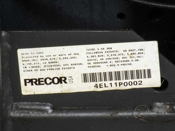 Precor EFX 5.17 bottom chassis label showing EFX 1/, 120V input, patent numbers, and serial number 4EL11P0002 with Precor USA branding