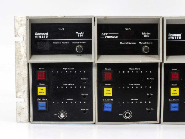 Det Tronics Model 880 gas detection monitor front panel close-up – showing Rexnord branding, %LFL scale, High Alarm, Low Alarm, Reset, Cal. Mode, and Trouble indicators with LED bar displays