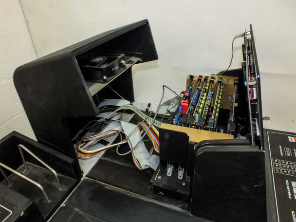 Sorvall RC-80 internal electronics compartment open showing multiple green circuit boards, ribbon cables, and wiring harnesses