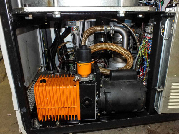 Sorvall RC-80 interior showing Alcatel 2012A vacuum pump (orange housing) and Alcatel 6063 oil diffusion pump with braided flex hose connections