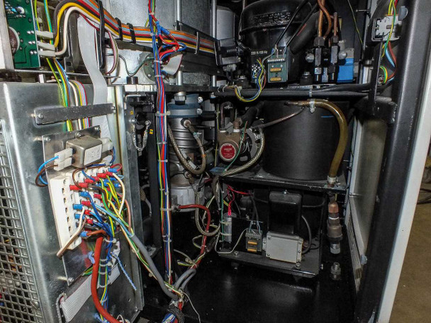 Sorvall RC-80 interior wiring detail showing junction box, multi-color wire harnesses, compressor assembly, solenoid valves, and plumbing fittings